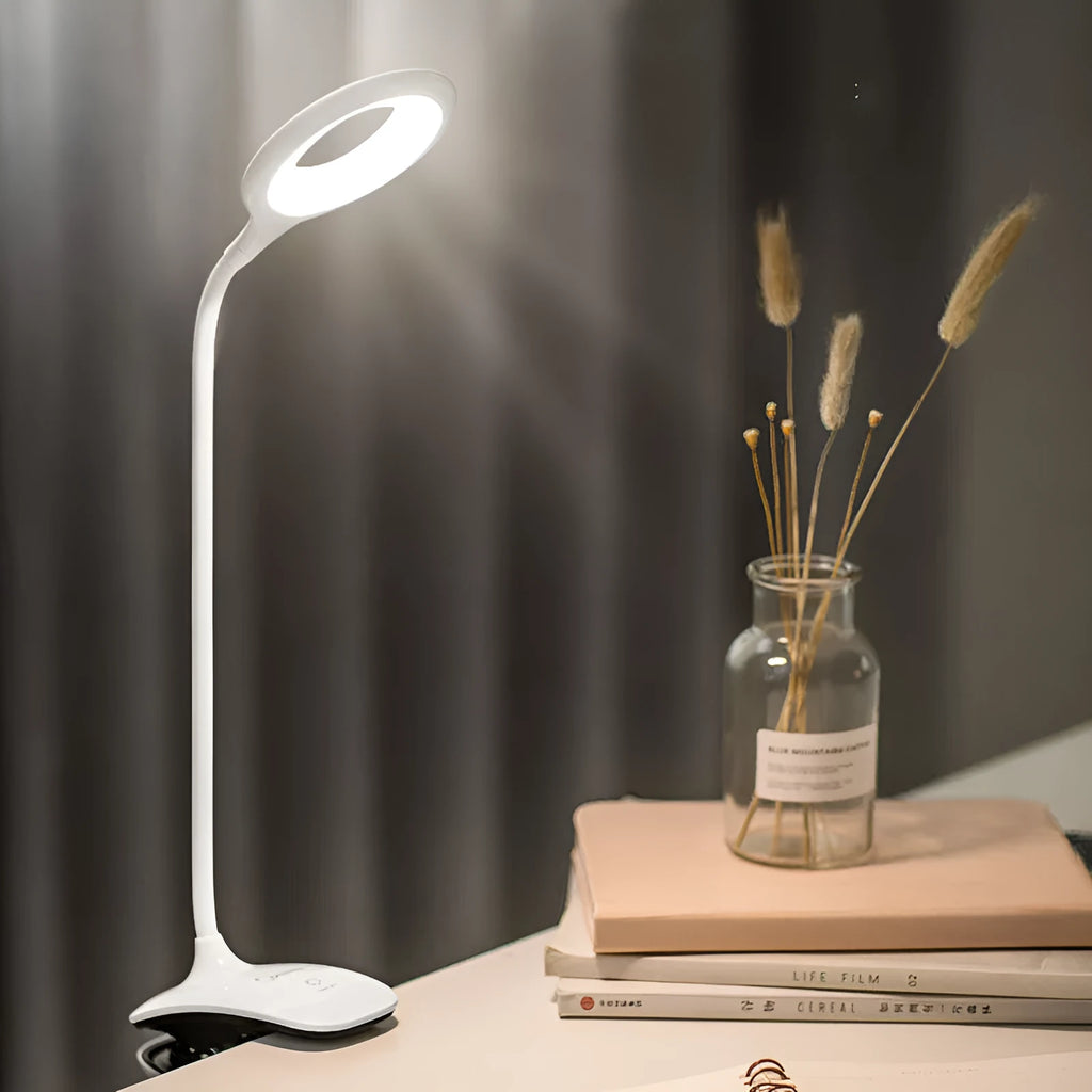 Green rechargeable table lamp with touch switch and USB charging port on wooden desk
