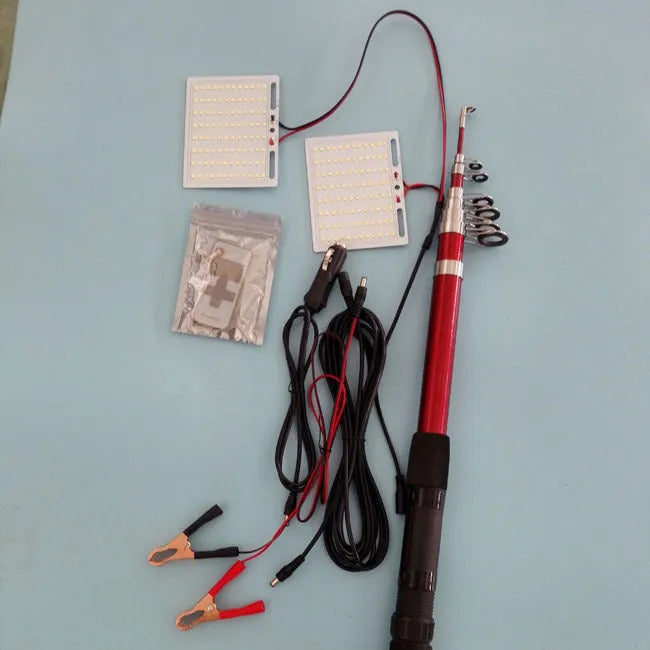 White LED fishing rod light unit mounted on top of an extended telescopic pole, with an RF remote control beside it.
