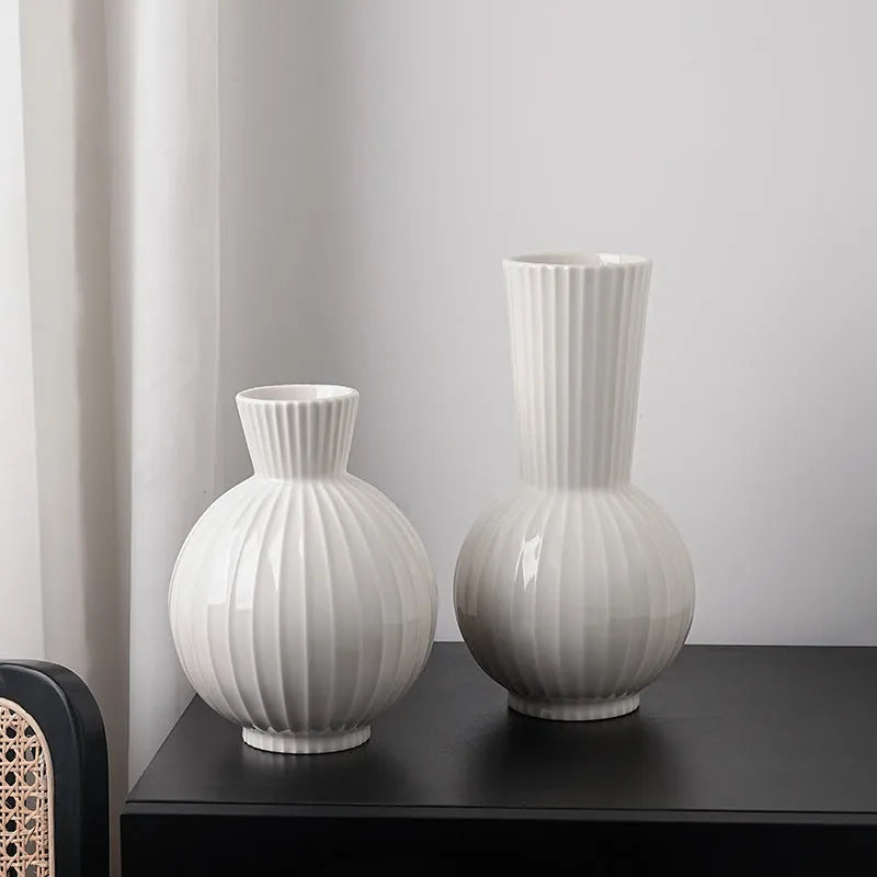 White ceramic ball striped vase on table with American country styling