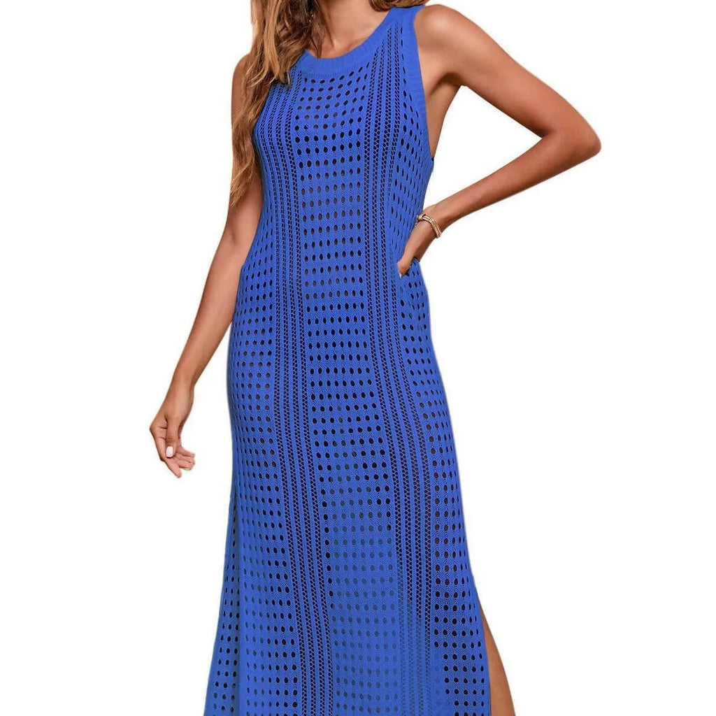 Long loose solid colour beach blouse with hollow-out knitted fabric on a hanger.