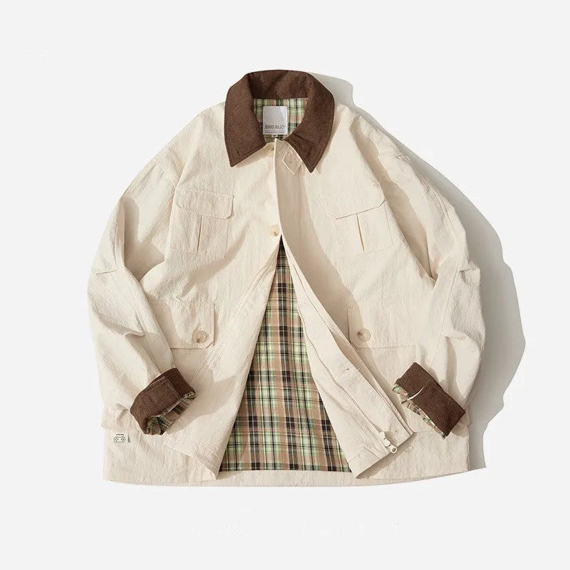 Green and apricot coloured casual jacket with side seam pockets on a mannequin