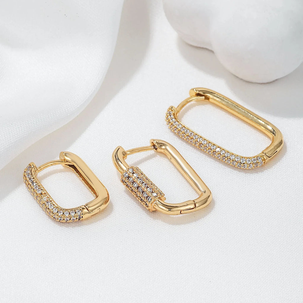 Three geometric copper ear clips with inlaid zircon in square design