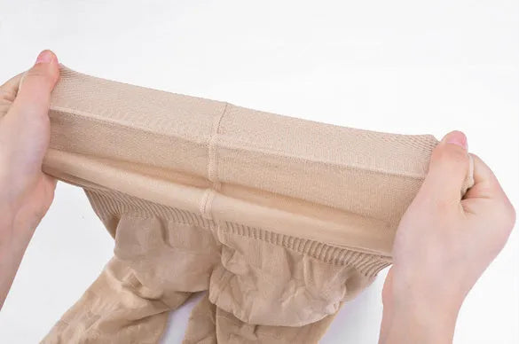 Women's seamless high-waist shapewear shorts for tummy control in black and nude colours
