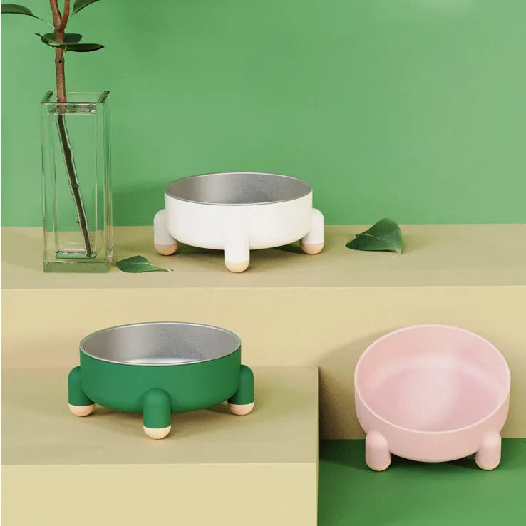 Stainless steel pet bowl with high feet in green, pink, or white colour options