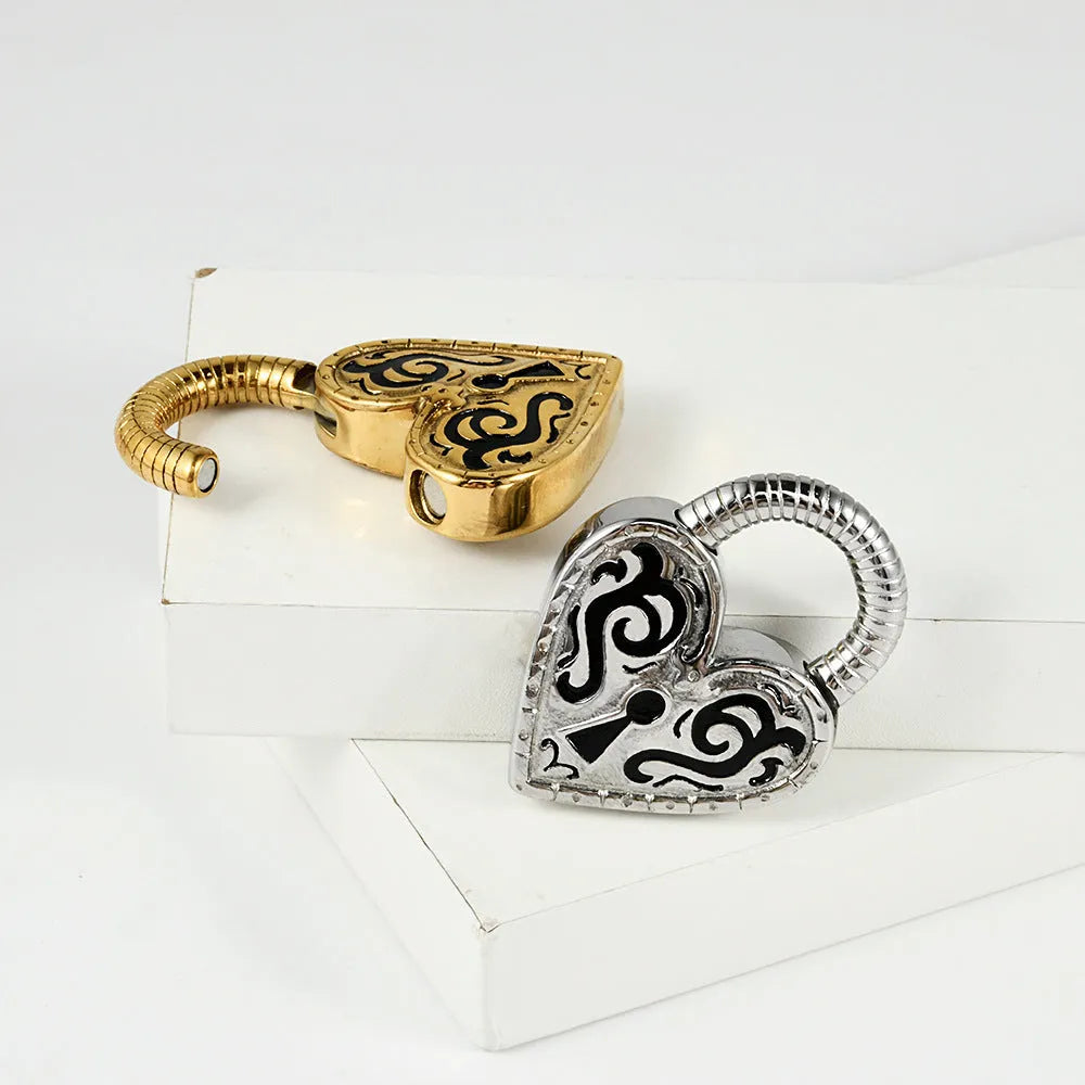 Heart-shaped stainless steel earrings with electroplated gold or steel colour finish