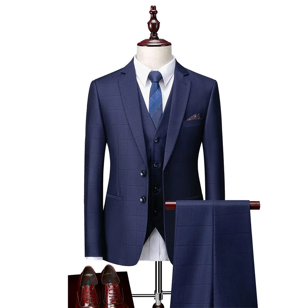 Men's navy blue slim fit three-piece suit with vest on hanger