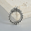 Large dragon-shaped hollow-out earrings in antique silver finish