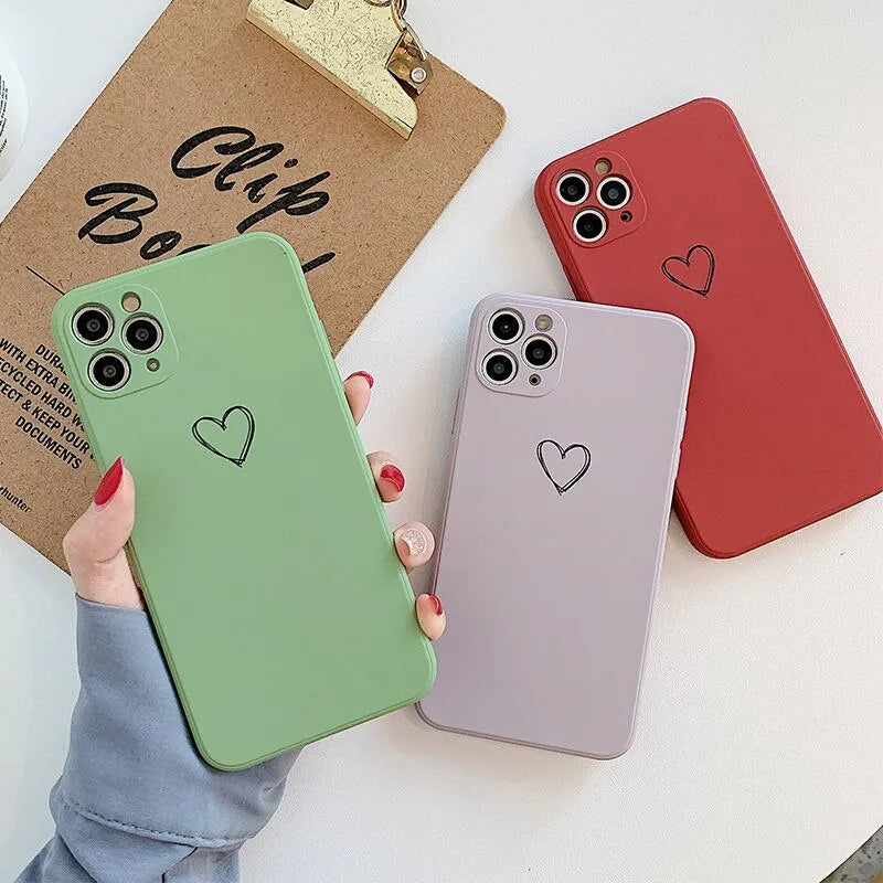 Silicone TPU back cover case for Apple iPhone in various solid colours including black, pink, and green.