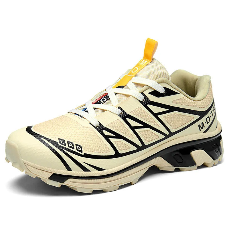 Men's and women's low-top hiking shoes in khaki colour with round toe and lace-up front.