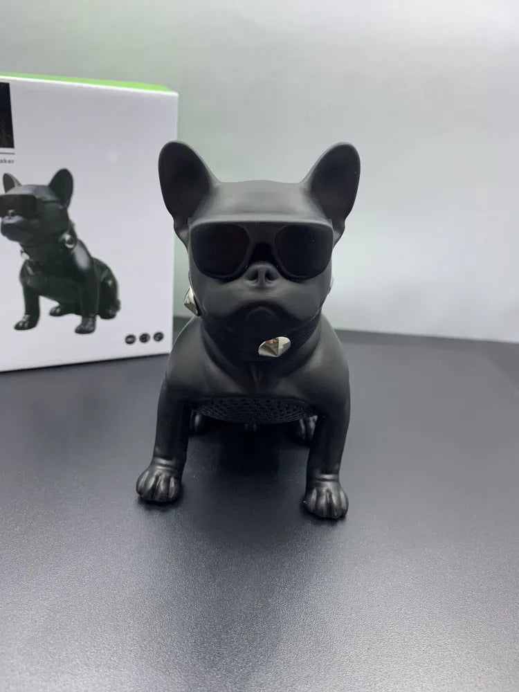 Mini bulldog-shaped Bluetooth speaker in black, red, or white colour, showing compact design.