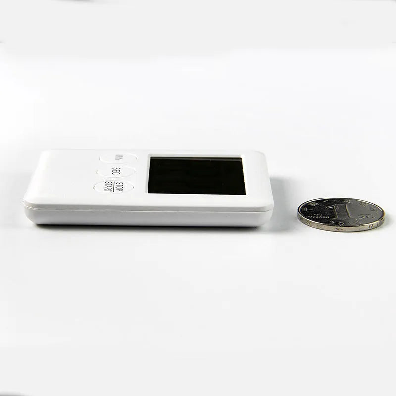 Magnetic kitchen timer with count up and countdown functions in black or white colour options