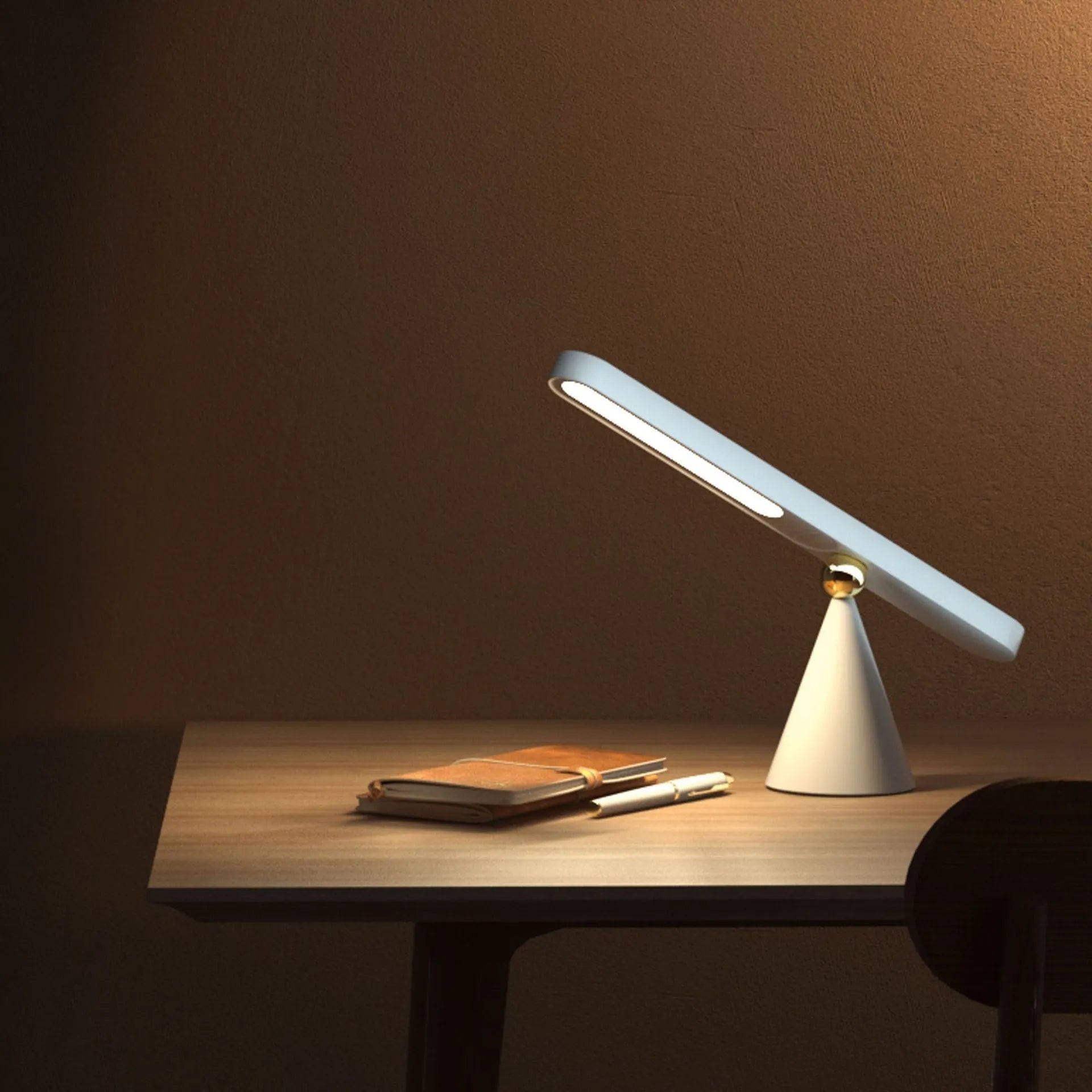Geometric desk lamp with magnetic suction showing touch switch and USB power connection