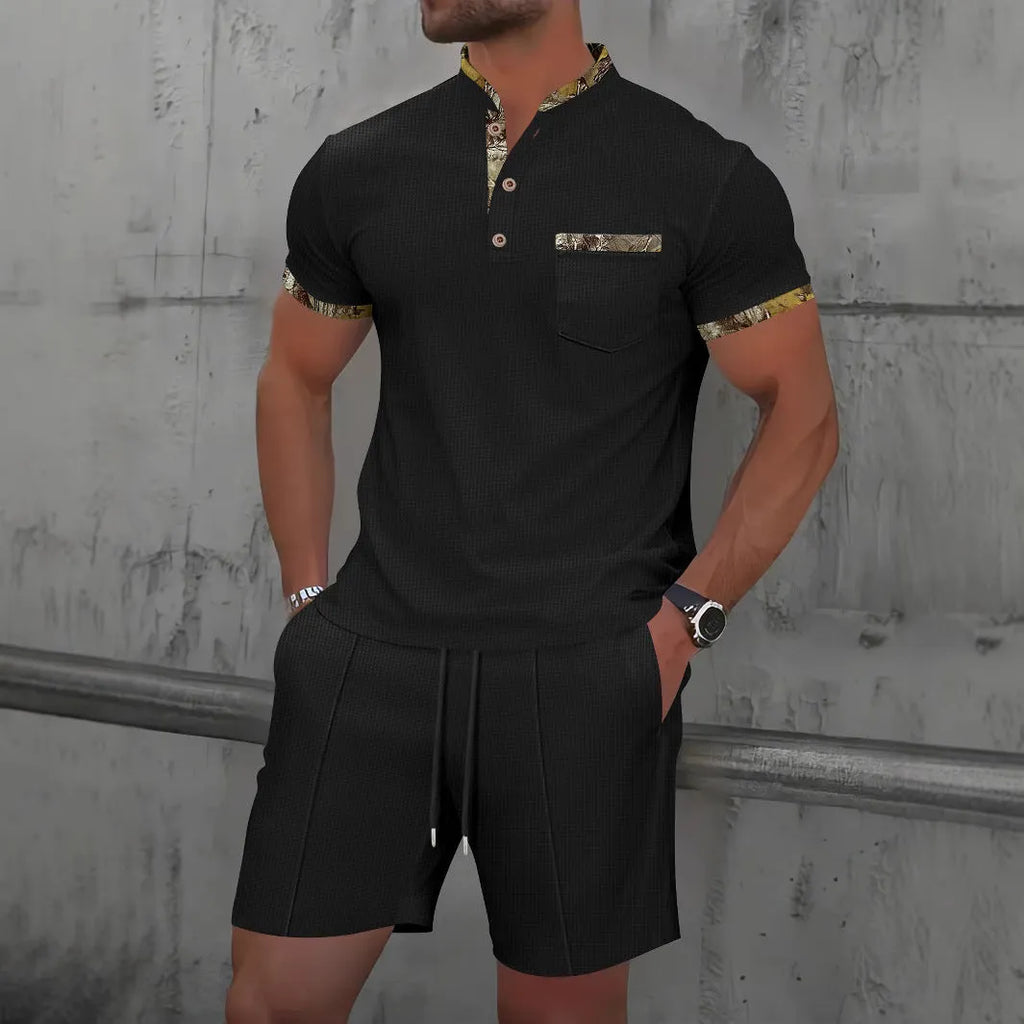 Men's grey waffle texture zipper polo short sleeve top with matching shorts laid flat