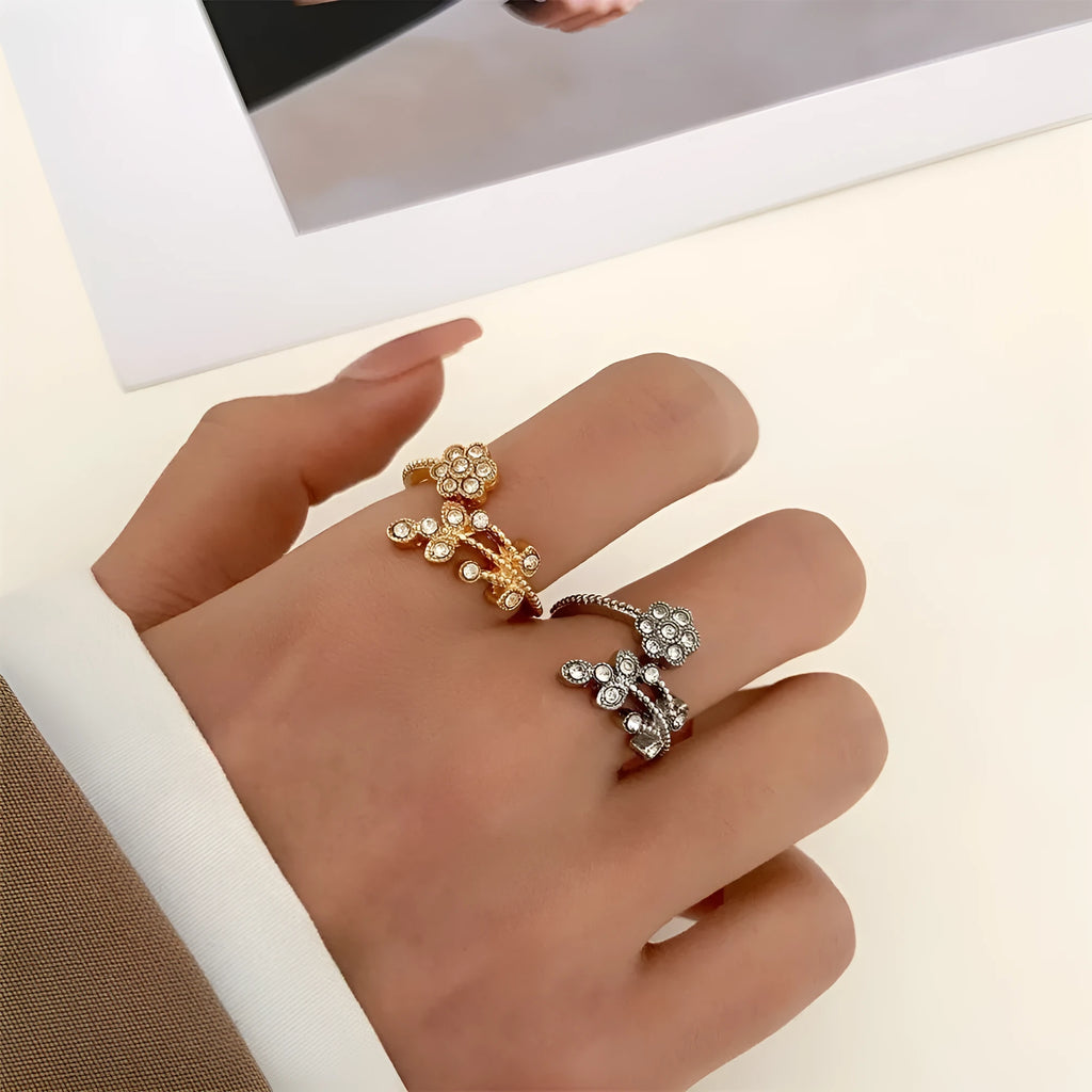 Copper open ring with diamond-treated floral and leaf decoration in gold colour
