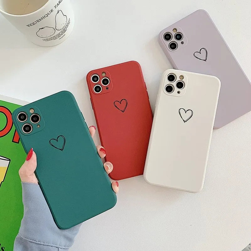 Silicone TPU back cover case for Apple iPhone in various solid colours including black, pink, and green.
