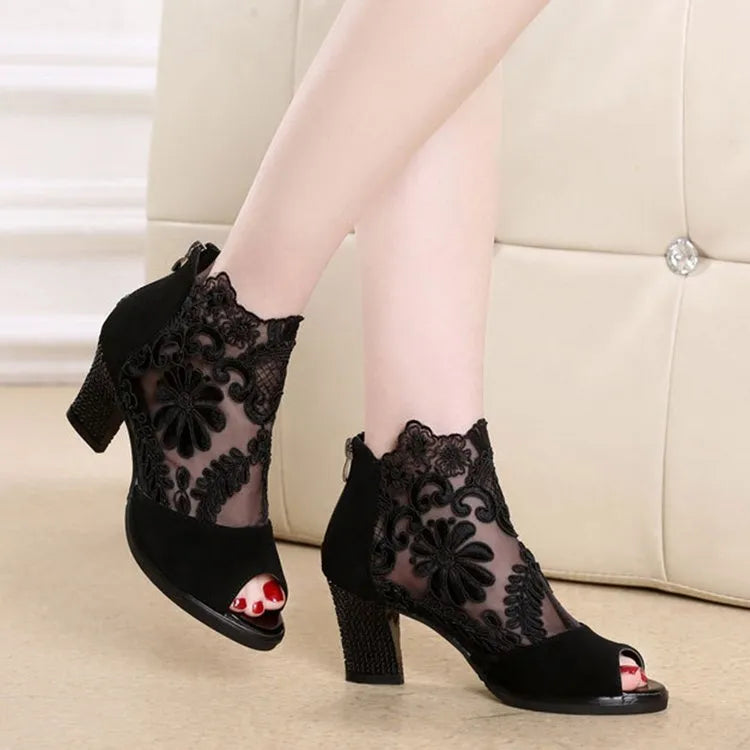 Black lace women's Gladiator sandals with a square high heel and peep toe on a zip closure