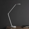 ProLED folding desk lamp with adjustable colour temperature shown on a wooden desk