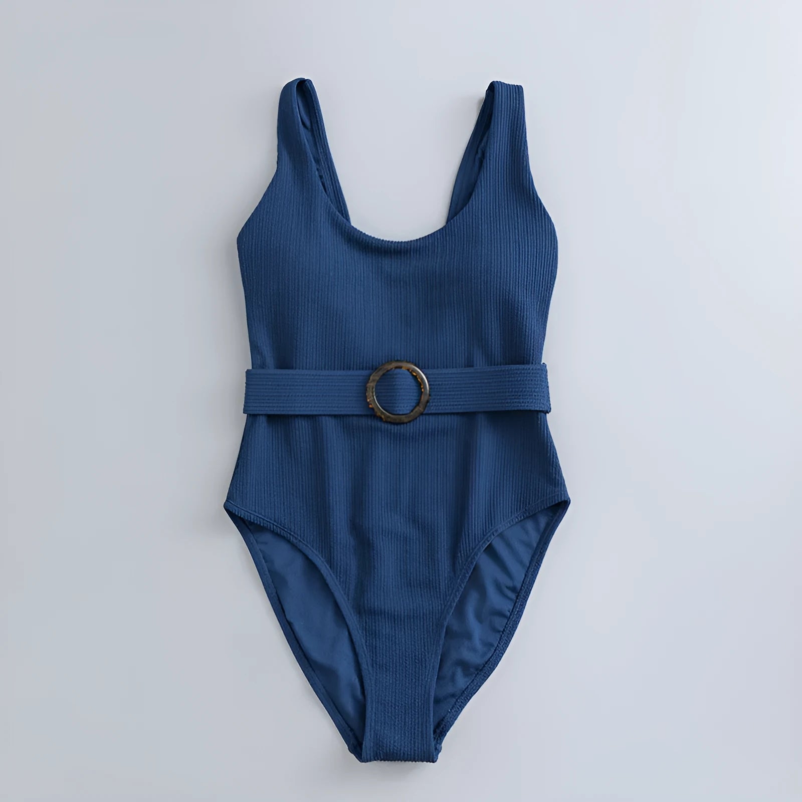 Navy blue women's one-piece triangle swimsuit with chest pads on a mannequin.