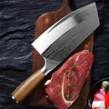 Stainless steel kitchen knife with 320mm blade on a kitchen counter