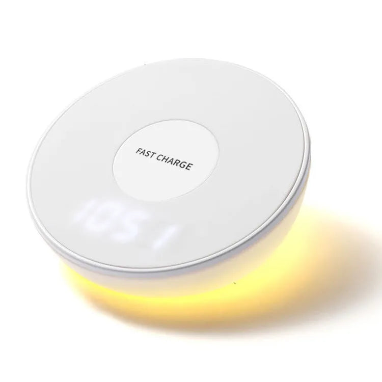 White wireless charging pad with digital clock display and three control buttons