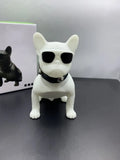 Mini bulldog-shaped Bluetooth speaker in black, red, or white colour, showing compact design.