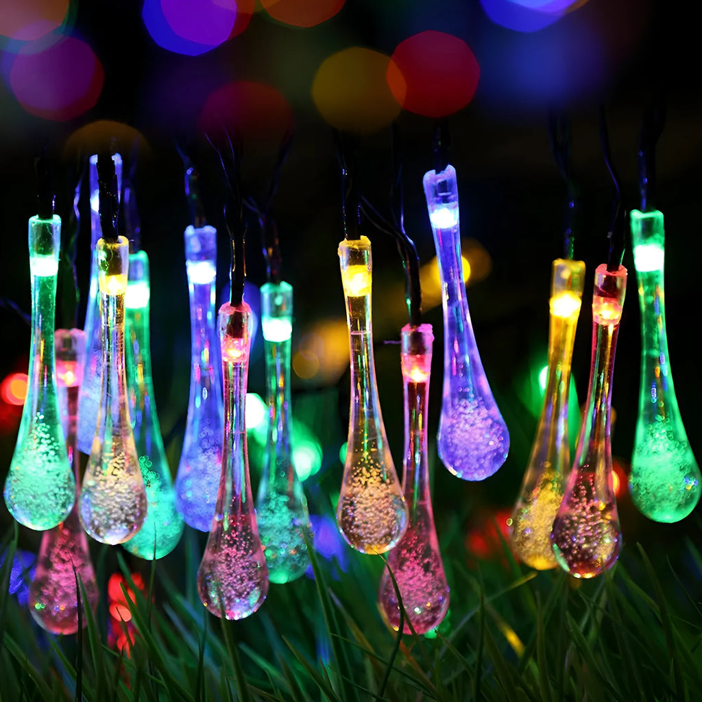 Solar-powered LED garden string lights with water drop shaped ABS pendants on a 6.5 metre wire.