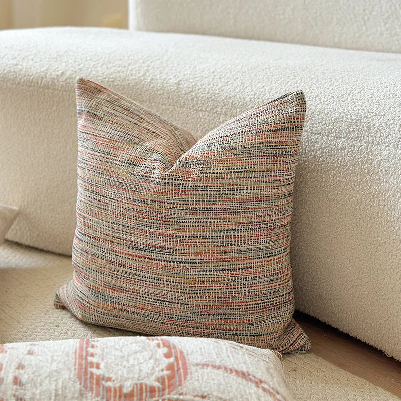 American-style jacquard throw pillow cover with paisley pattern in amber tones, shown in square and rectangular sizes.