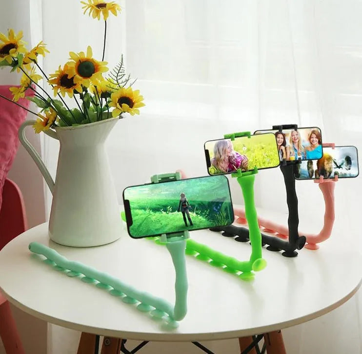 Black flexible lazy bracket phone holder extended to 62cm with suction cup mount showing 360° rotation mechanism