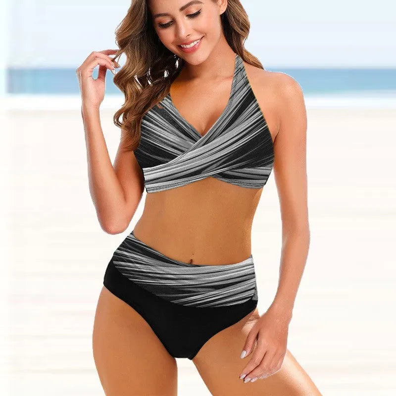 Ladies striped tie-dye hollow pattern bikini set with high-waisted briefs on a model.