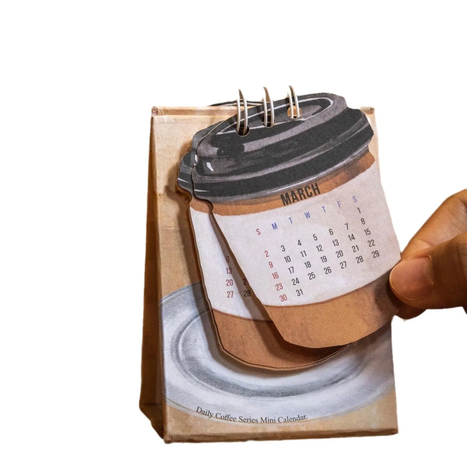 Mini 2025 desk calendar showing multiple design options including Coffee Time and Life Is Not Easy themes