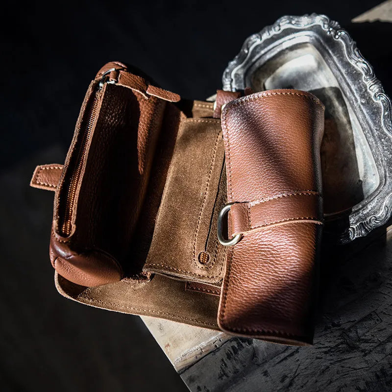 Handmade vintage bifold wallet in genuine cow leather showing tape extraction closure