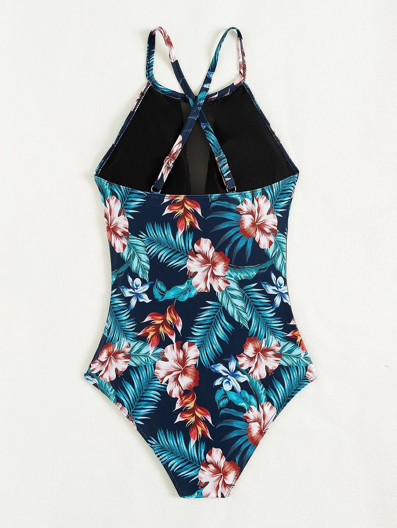 Women's deep V-neck one-piece swimsuit in a solid colour, showing European and American style design.