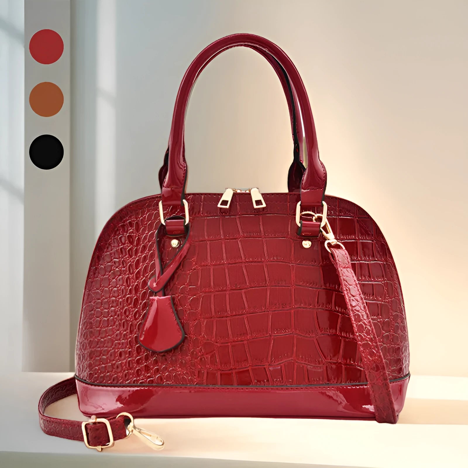 Shiny PU leather crossbody bag in shell shape design showing black, red and brown colour options