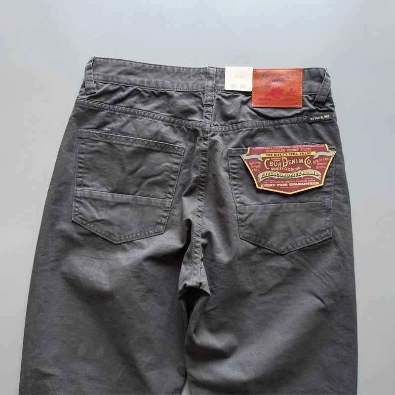 Men's straight-leg cotton trousers in American retro style showing solid colours and classic cut