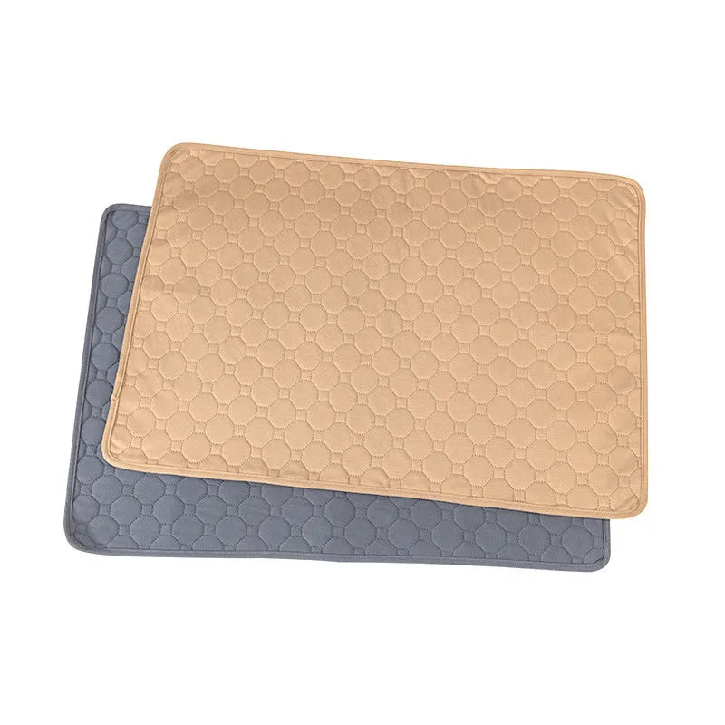Grey and tan washable dog pee pads showing waterproof backing and size options