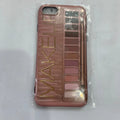 A flesh-coloured silicone case next to a grey one for various iPhone models.