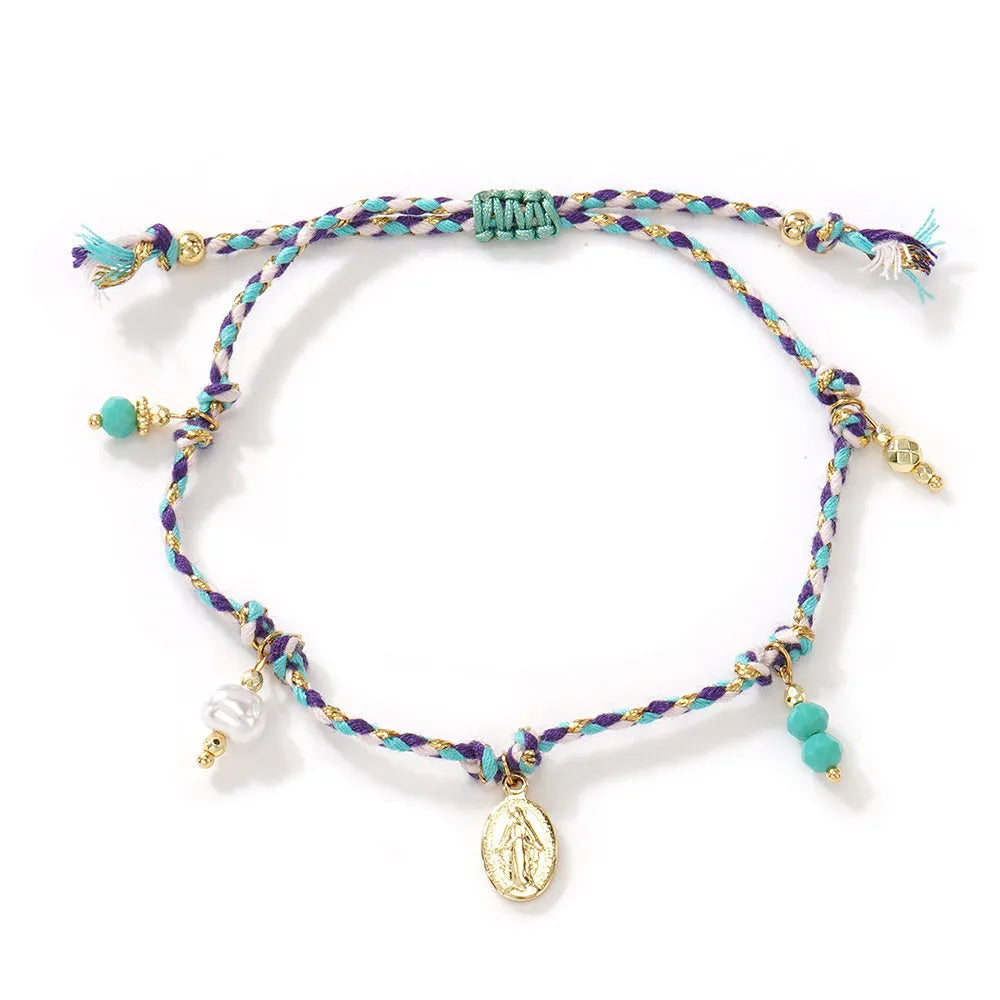Close-up of a hand-woven colourful braided rope bracelet for women featuring an adjustable carrying strap tag closure.