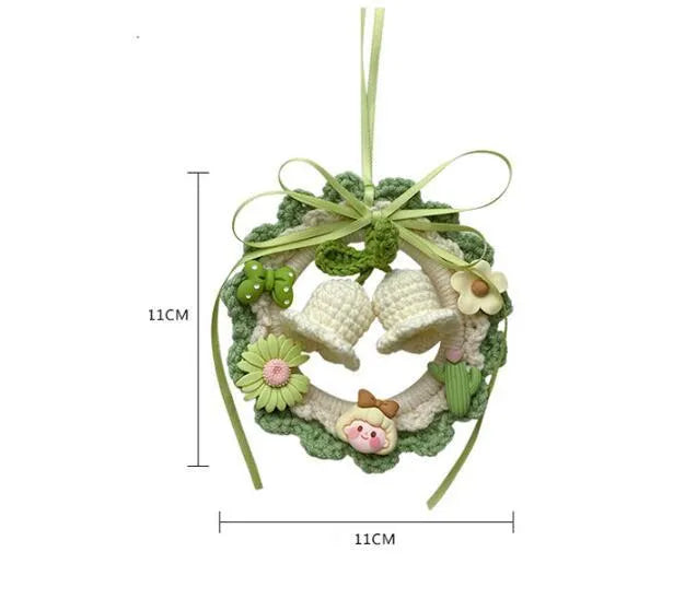 Handmade woven wool bell orchid car pendant hanger in green, shown with optional dream catcher