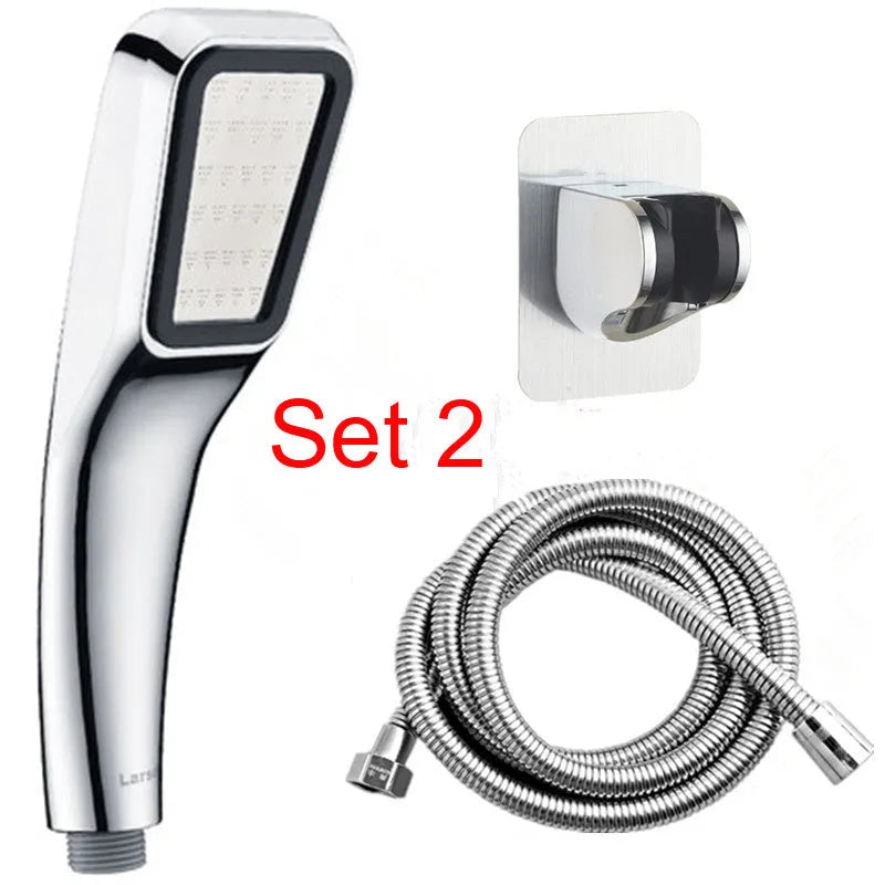 Orange hand-held pressurised shower with 60mm rain spray face
