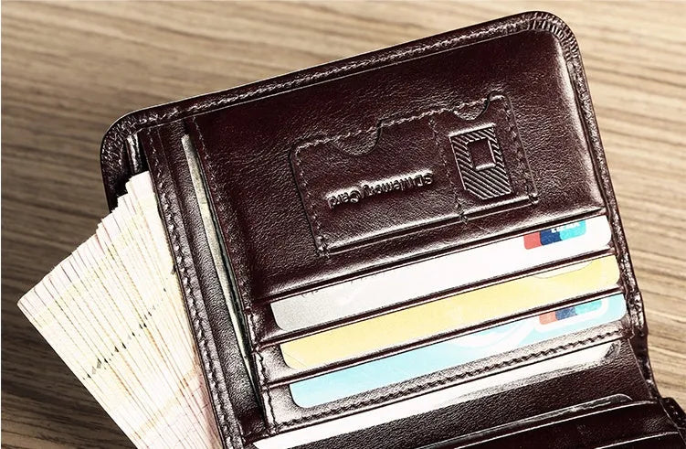 Men's leather wallet open showing card slots, coin pocket, photo window, and document holder in black or brown