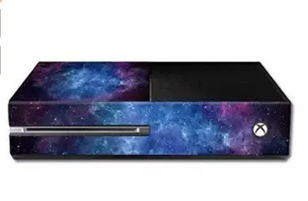 Blue matte vinyl skin sticker applied to an Xbox One console for scratch protection.