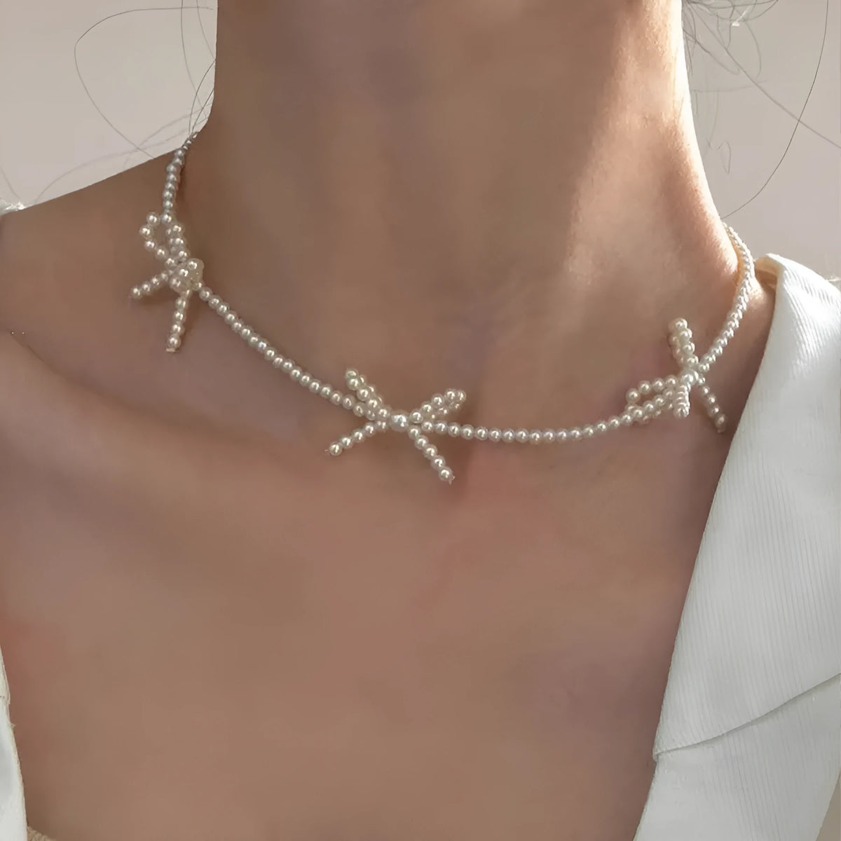 White bow design imitation pearl necklace for women with adjustable 31-40cm chain
