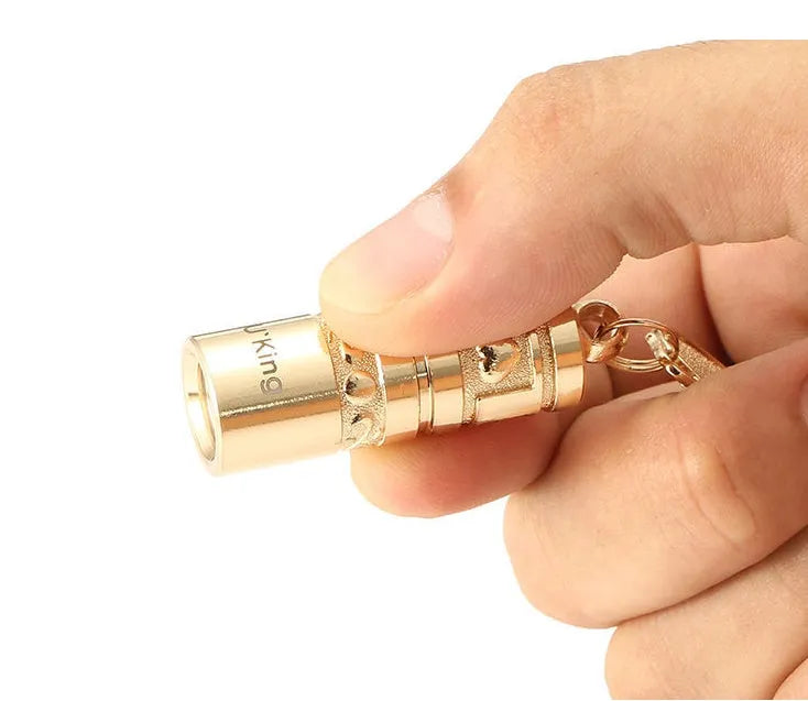 Waterproof mini portable LED flashlight keychain with gold zinc alloy housing