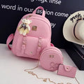 Floral design women's three-piece bag set showing backpack, shoulder bag, and card holder in PU leather.