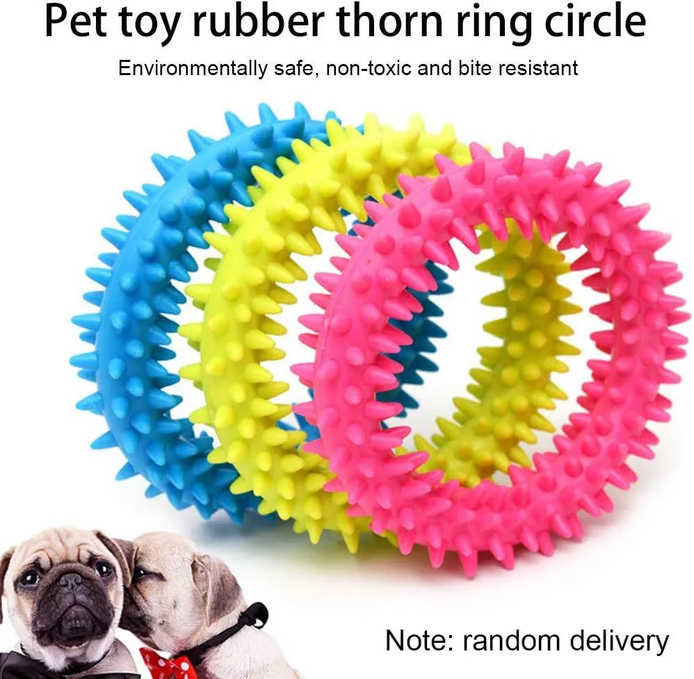 Blue TPR spiky circle ring dog chew toy for dental cleaning on a white background.