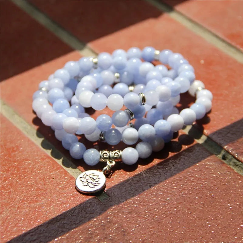A vintage-style women's bracelet made from natural stone with a geometric lotus design.