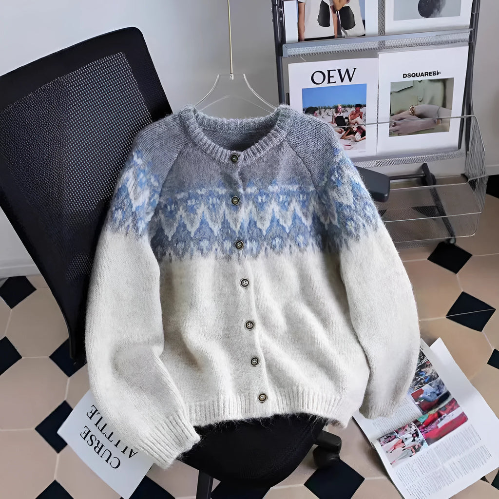Women's loose fit jacquard knit sweater coat in milky white, shown on a hanger.