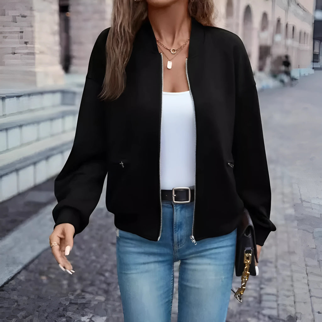 Black women's casual zip jacket with faux pockets and long sleeves