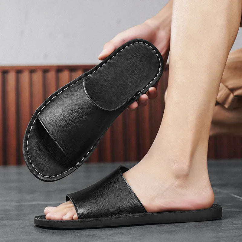 Men's brown leather outdoor sandals with a rubber sole on a white background