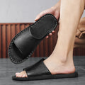 Men's brown leather outdoor sandals with a rubber sole on a white background